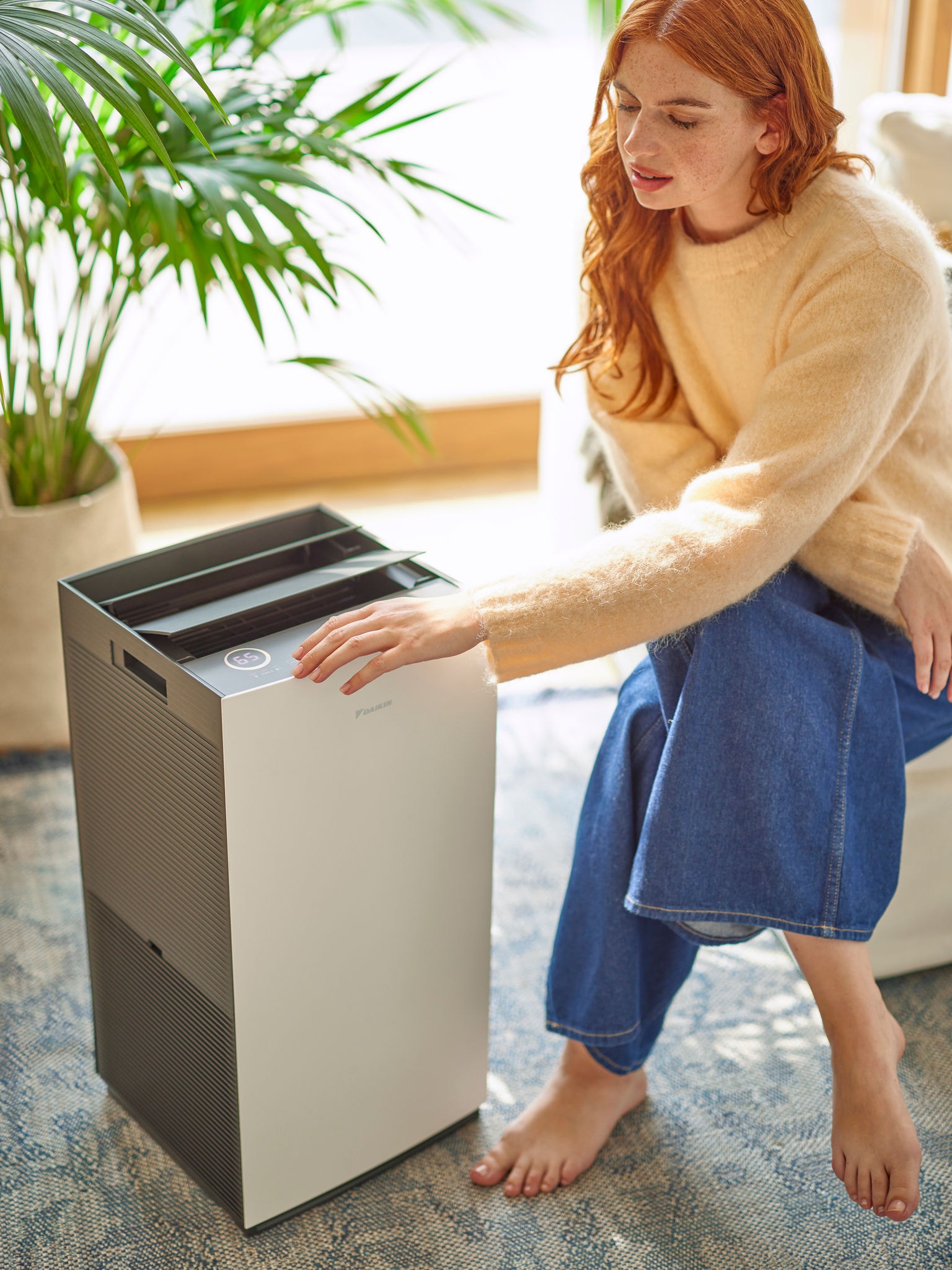 Mujer afectada por el polvo doméstico